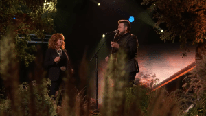 Reba McEntire sang Back to God with one of her contestants, fan-favorite Josh Sanders