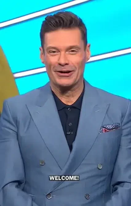 Ryan seacrest falls wheel of fortune