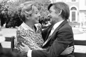 Michael Learned and Ralph Waite as Olivia and John Walton hugging in a scene from The Waltons